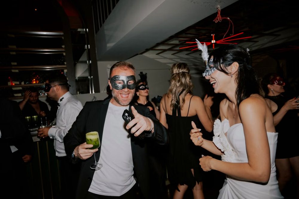 Guests at a masquerade party